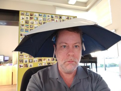 the author wearing an umbrella hat