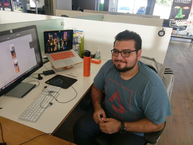 Co-worker C-Bass at this desk