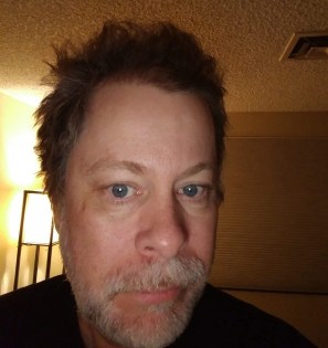 Looking scruffy and needing a haircut